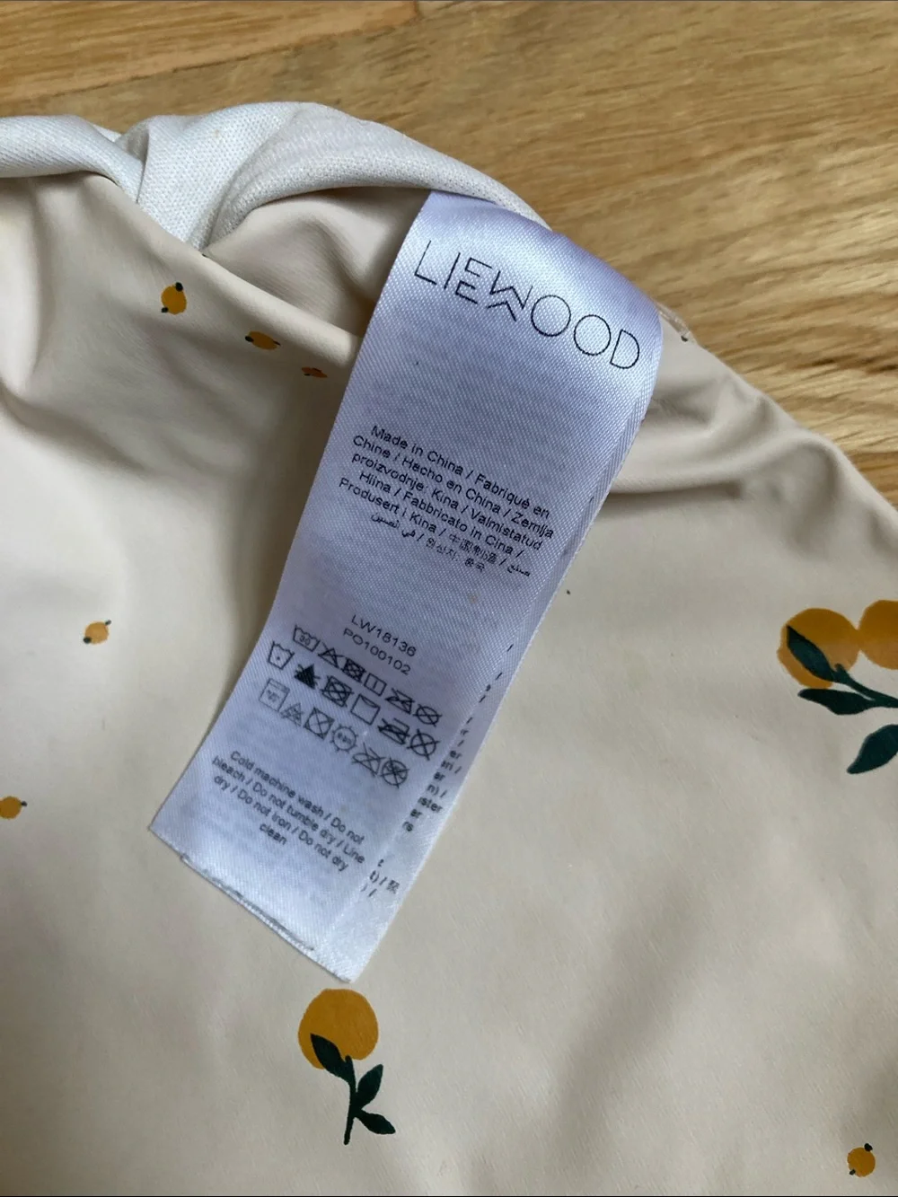 Waterproof Kids Feeding Bib Smock in Cream with Orange Print